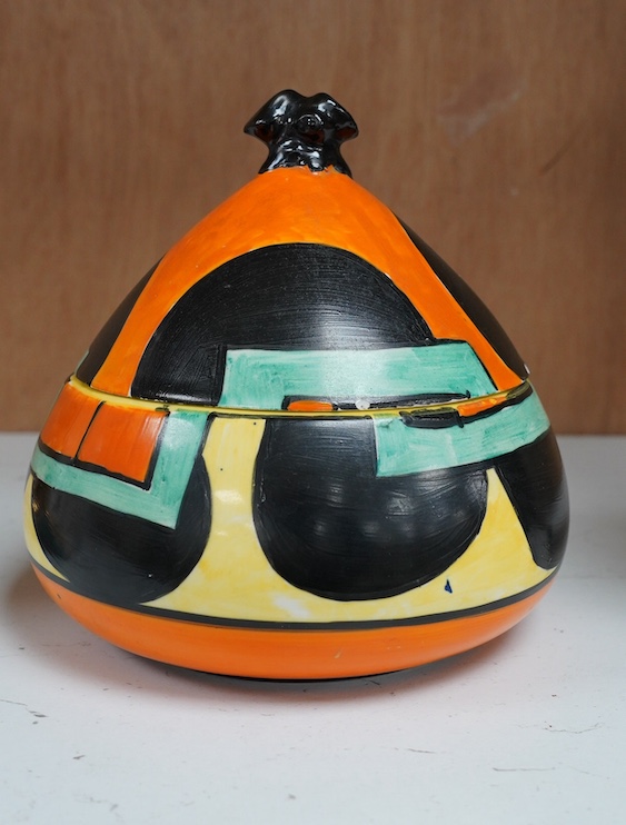 A Clarice Cliff Bizarre bon-bon jar and cover, 14cm. Condition - poor to fair, discoloured crazing to interior